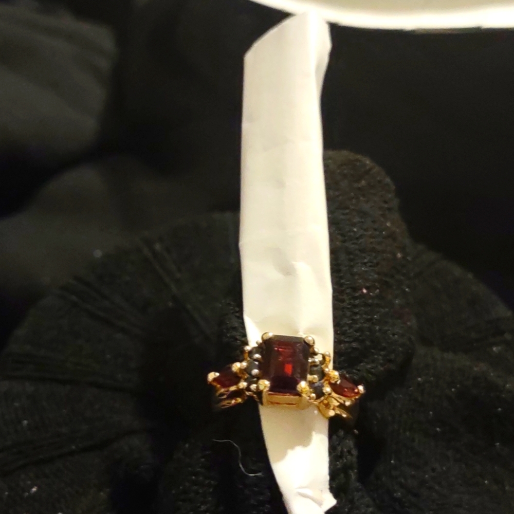 SALE WAS $39  NOW $18 RED GARNET, EMERALD CUT  SET IN GOLD RODIUM